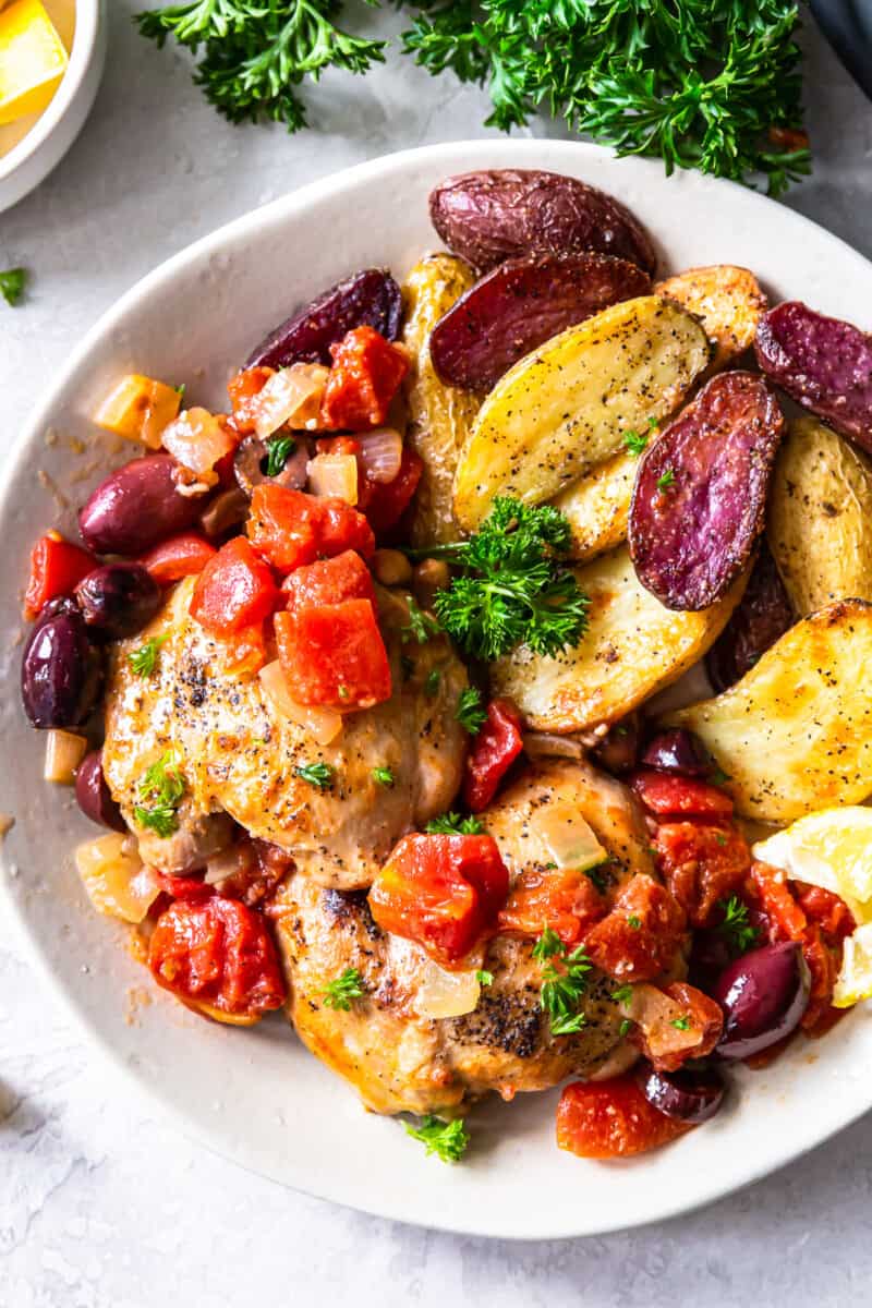 plate of chicken provencal with potatoes