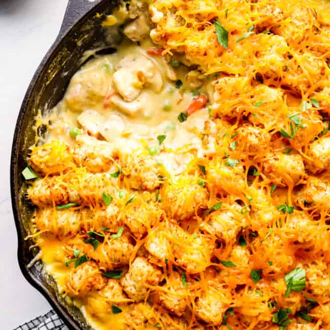 spoonful out of tater tot chicken casserole with cheese