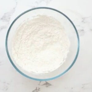 flour and cornstarch in a glass bowl.