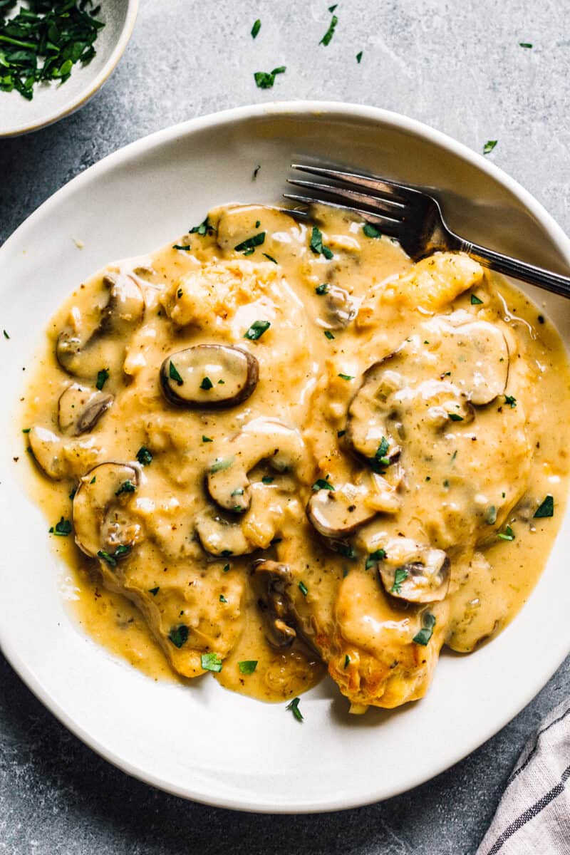 white plate with instant pot chicken marsala