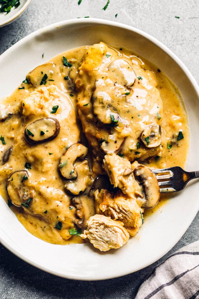 white plate with instant pot chicken marsala