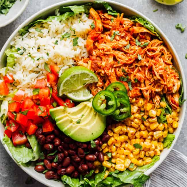 bowl of instant pot shredded chicken with rice and corn