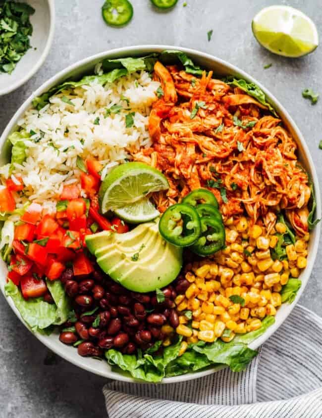 bowl of instant pot shredded chicken with rice and corn