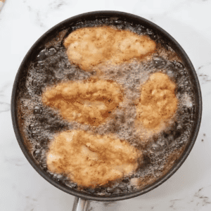 fried chicken in a pan.