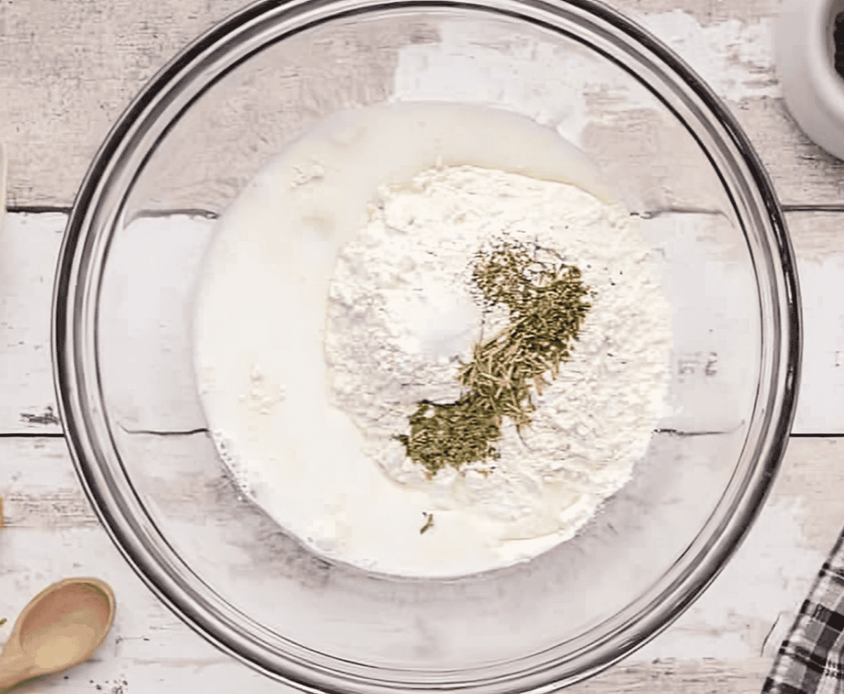 flour and seasonings in a glass bowl.