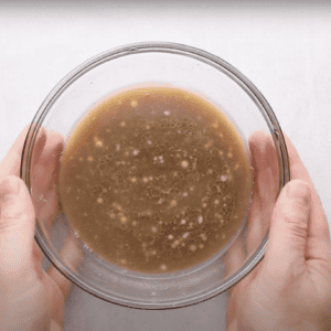 brown liquid in a glass dish.