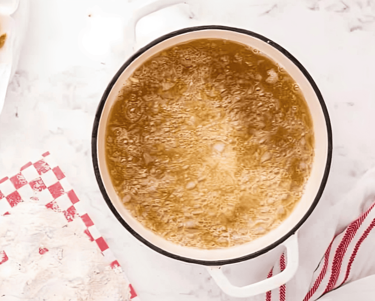 frying chicken tenders in a Dutch oven.