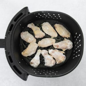 chicken wings in an air fryer before cooking