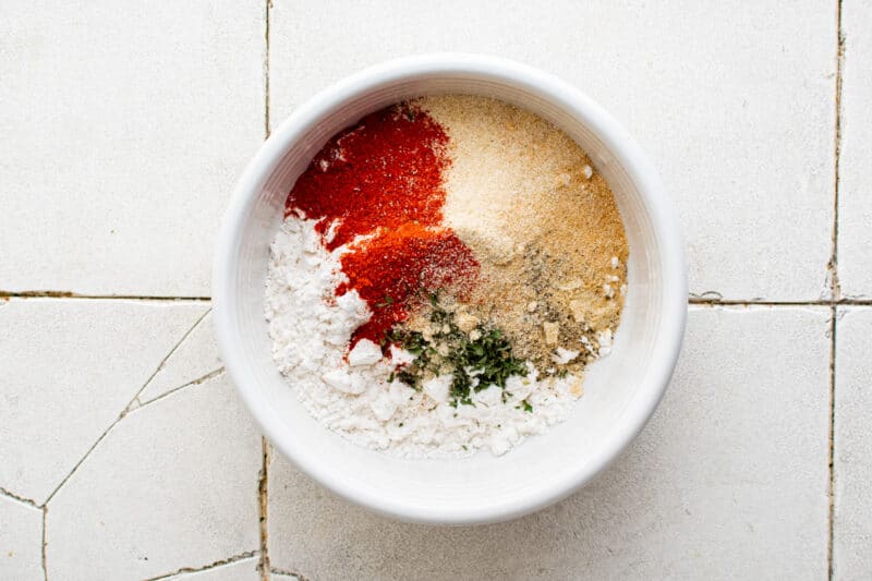 flour and spices in a white bowl