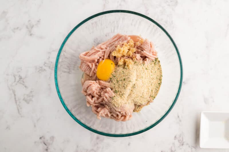 chicken meatball mixture in a glass bowl