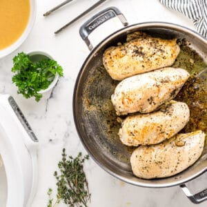 chicken breasts in a skillet