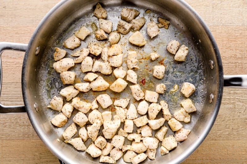 cooked chicken breast pieces in a skillet