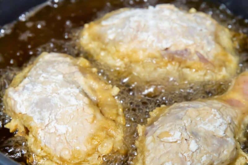 frying chicken in a pan