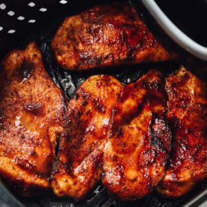BBQ chicken breasts in the air fryer basket