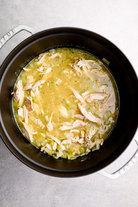 crack chicken soup in a pot