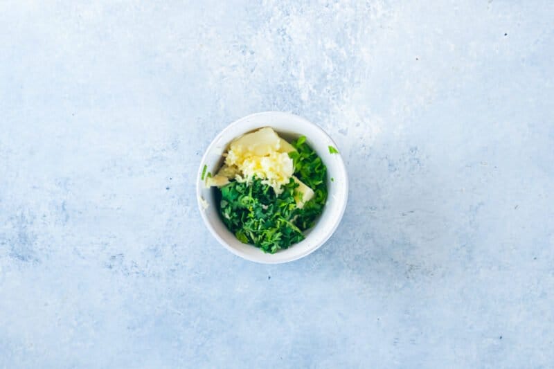 overhead view of herb butter ingredients for chicken kiev.