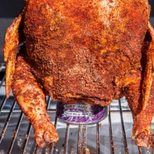 beer can chicken on a grill.