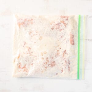 marinating chicken breasts in a zip-top bag.