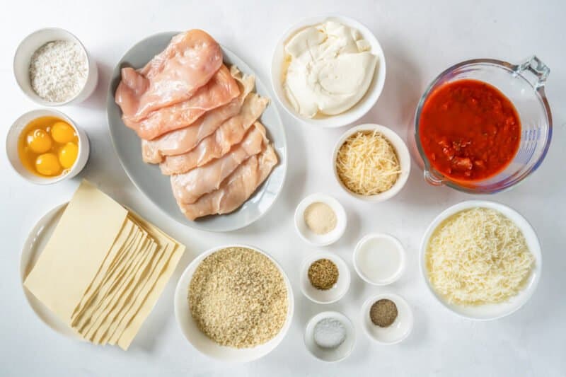 overhead view of ingredients for chicken parmesan lasagna.