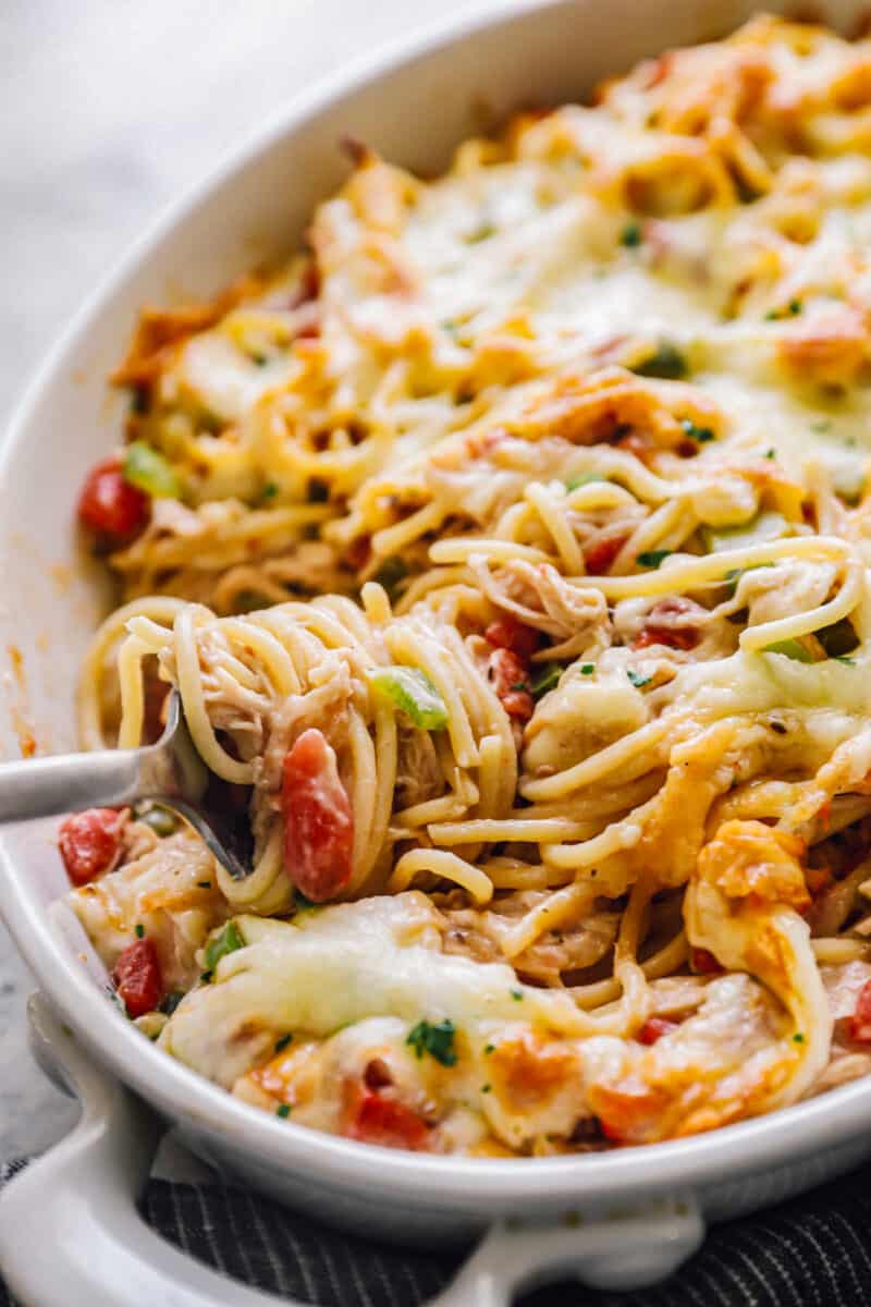 chicken spaghetti casserole filled with bell peppers and cheese