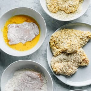 dredging chicken with flour and eggs