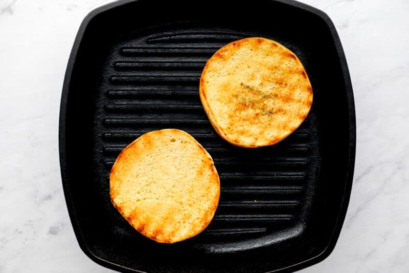 grilled hamburger buns on a grill pan