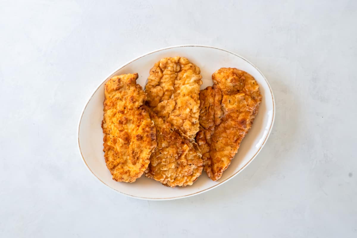 four crispy chicken breasts