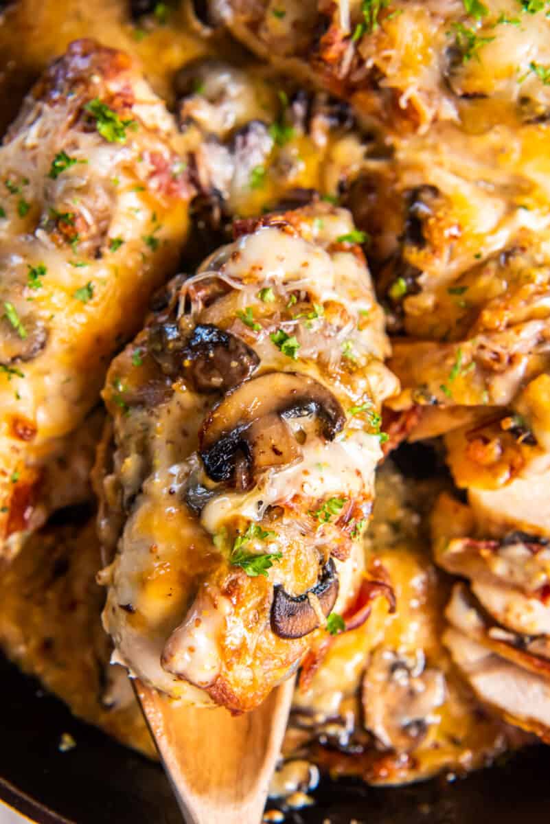 chicken breast with cheese, mushrooms, and bacon