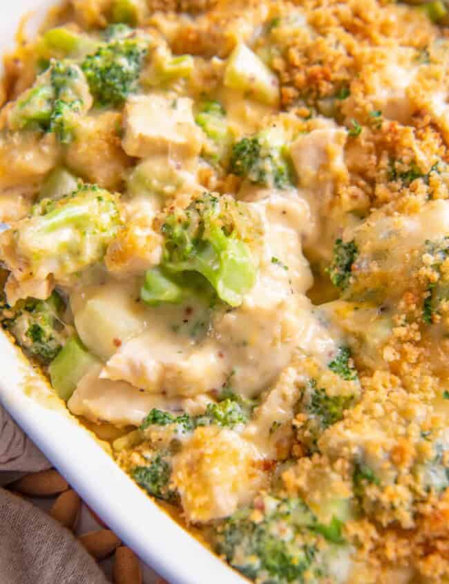 close up on chicken divan, filled with broccoli, chicken, and breadcrumbs