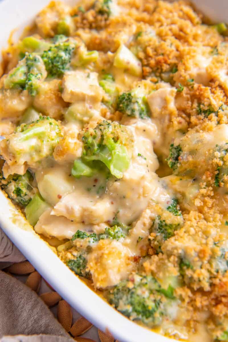 close up on chicken divan, filled with broccoli, chicken, and breadcrumbs