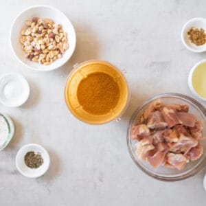 peanut sauce in a blender, on a countertop with other ingredients