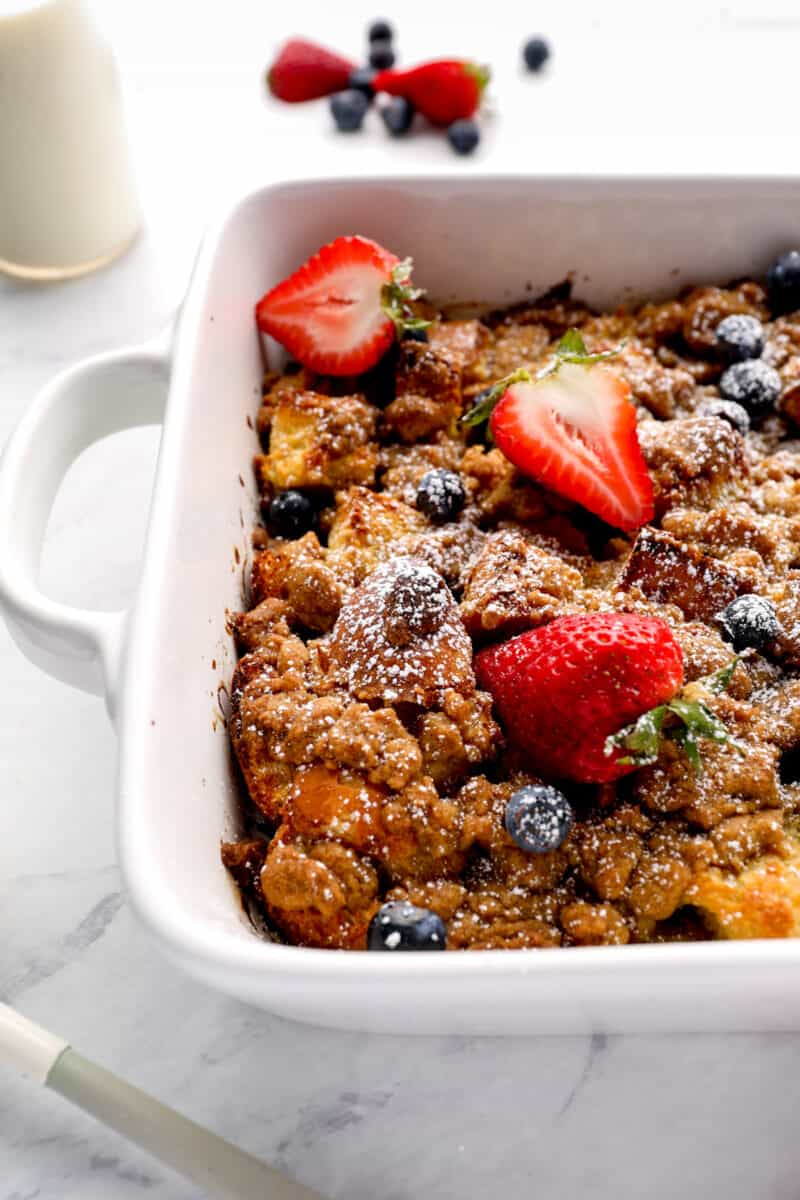 French toast casserole topped with berries