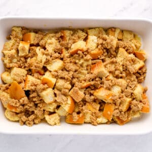 French toast casserole in a white baking dish