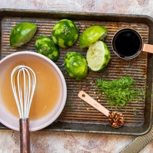 ingredients for honey lime marinade on a baking tray
