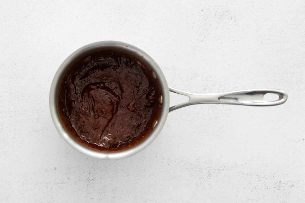 Korean gochujang wing sauce in a saucepan.