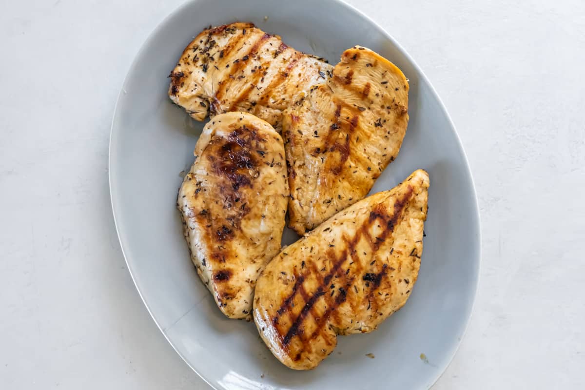 grilled chicken breasts on a plate