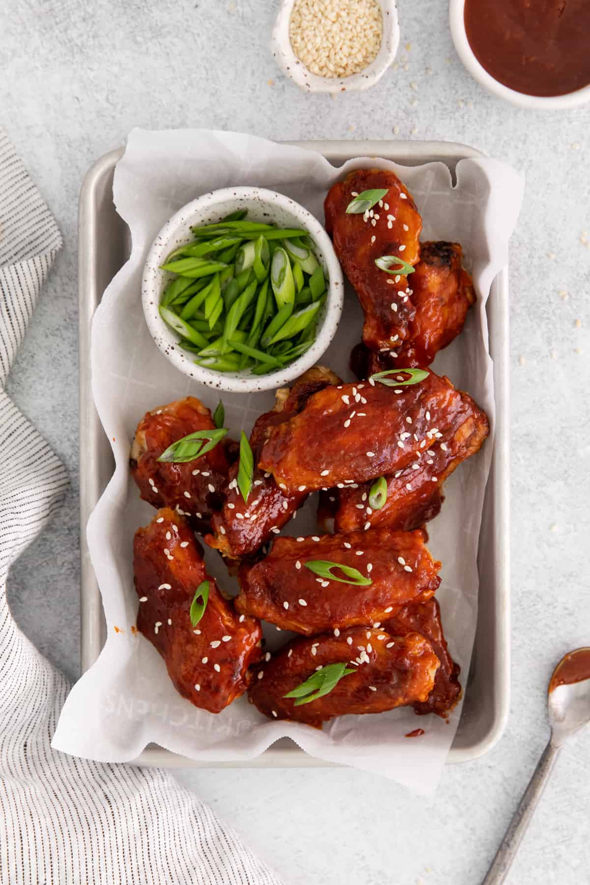 a tray of oven baked Korean chicken wings