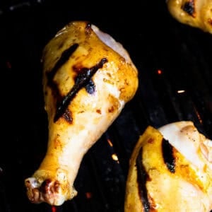 grilling honey lime chicken drumsticks.