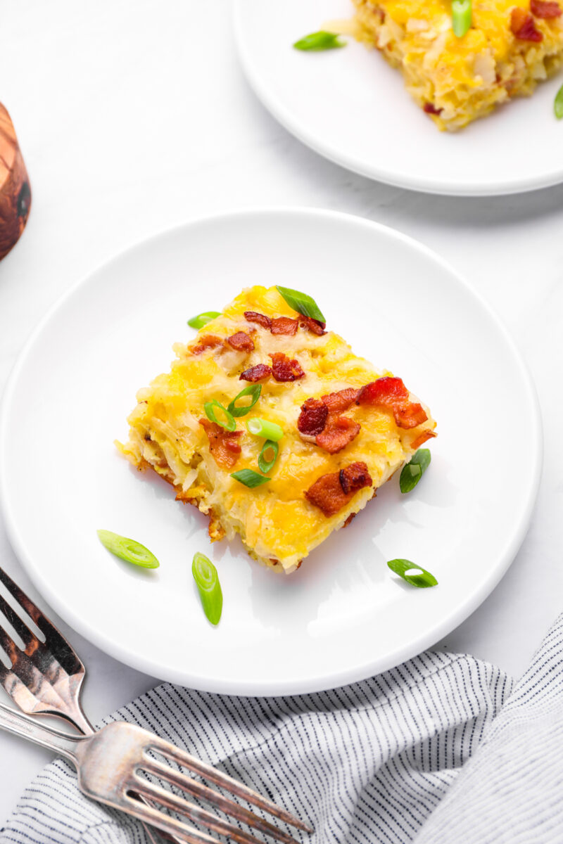 square of breakfast casserole on a white plate