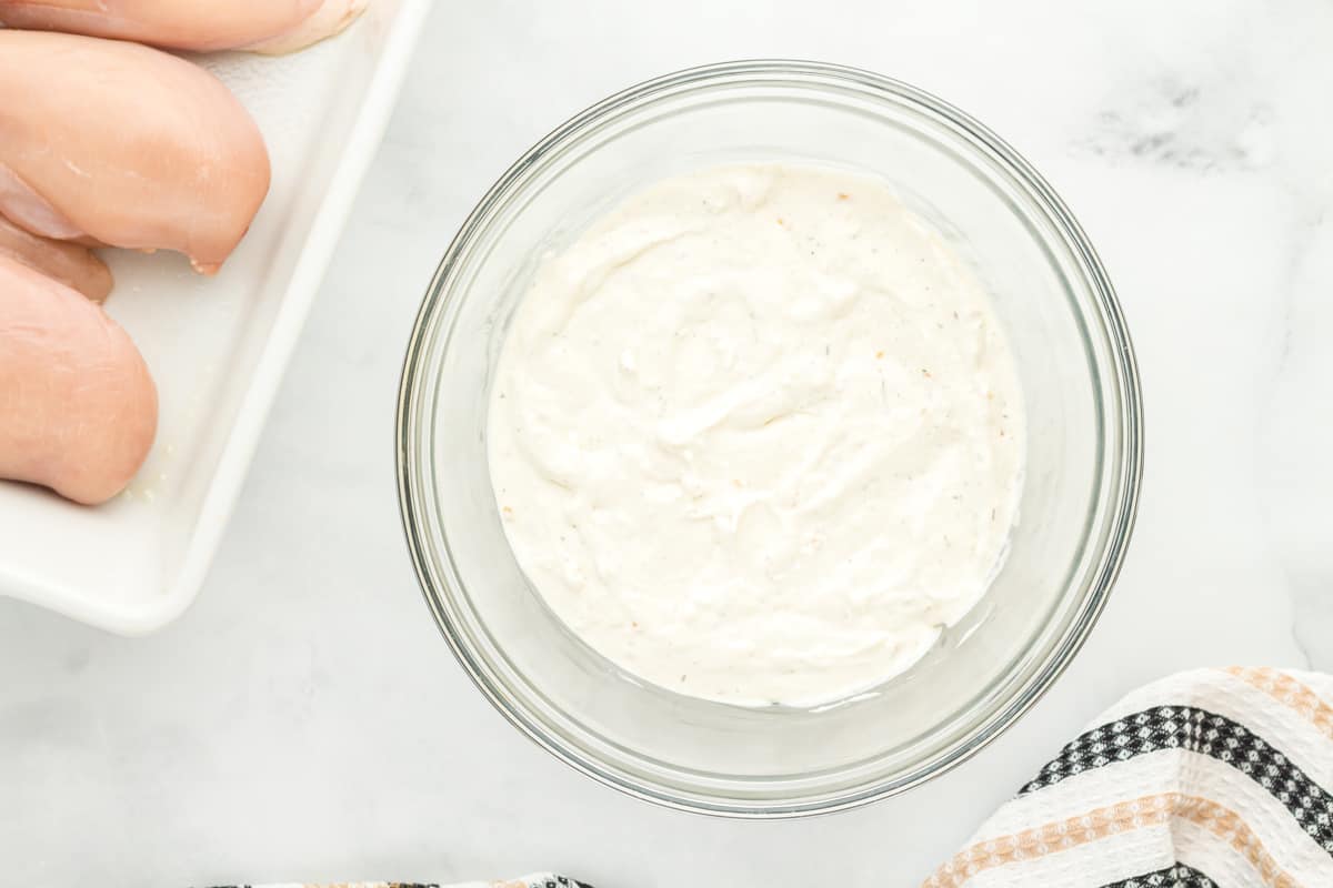 creamy herb chicken sauce in a glass bowl.