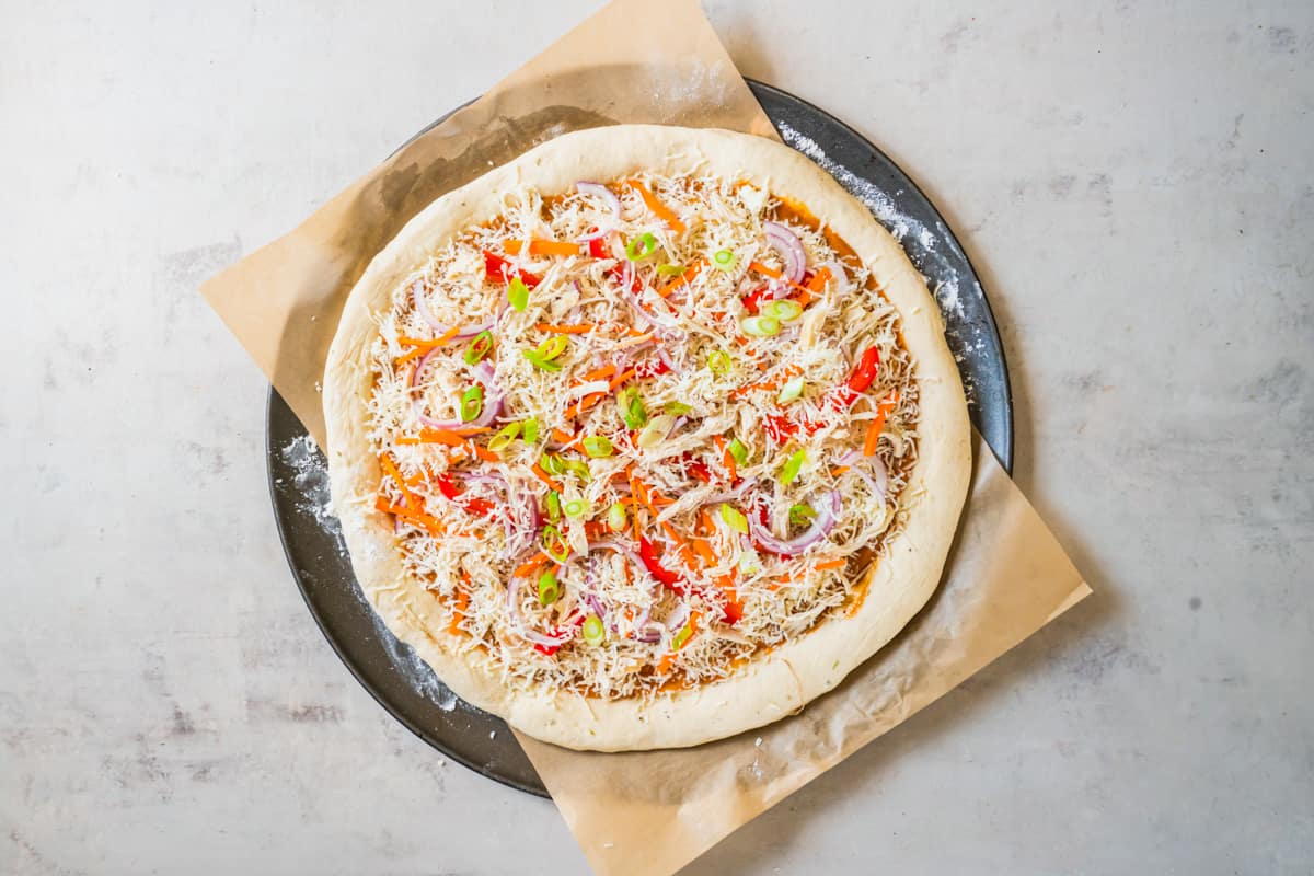pizza with all toppings, before baking