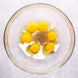 eggs and seasonings in a mixing bowl
