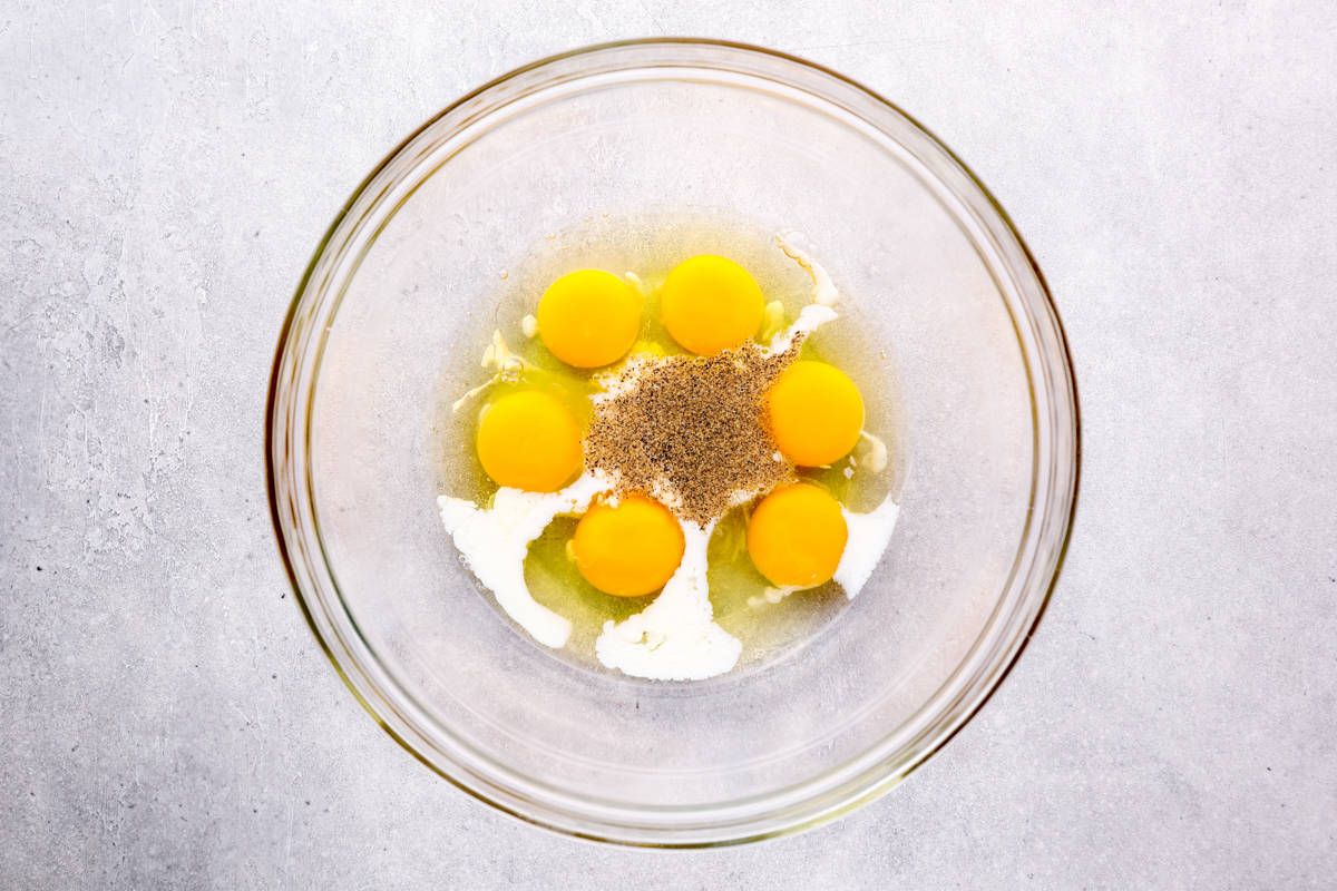 eggs and seasonings in a mixing bowl