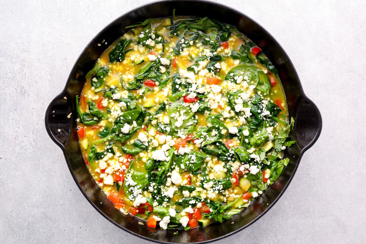 frittata cooking in a skillet