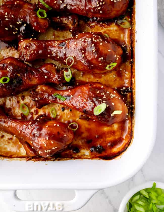 close up on a baking dish filled with baked teriyaki chicken
