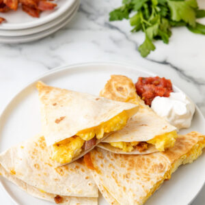 breakfast quesadillas on a white plate.