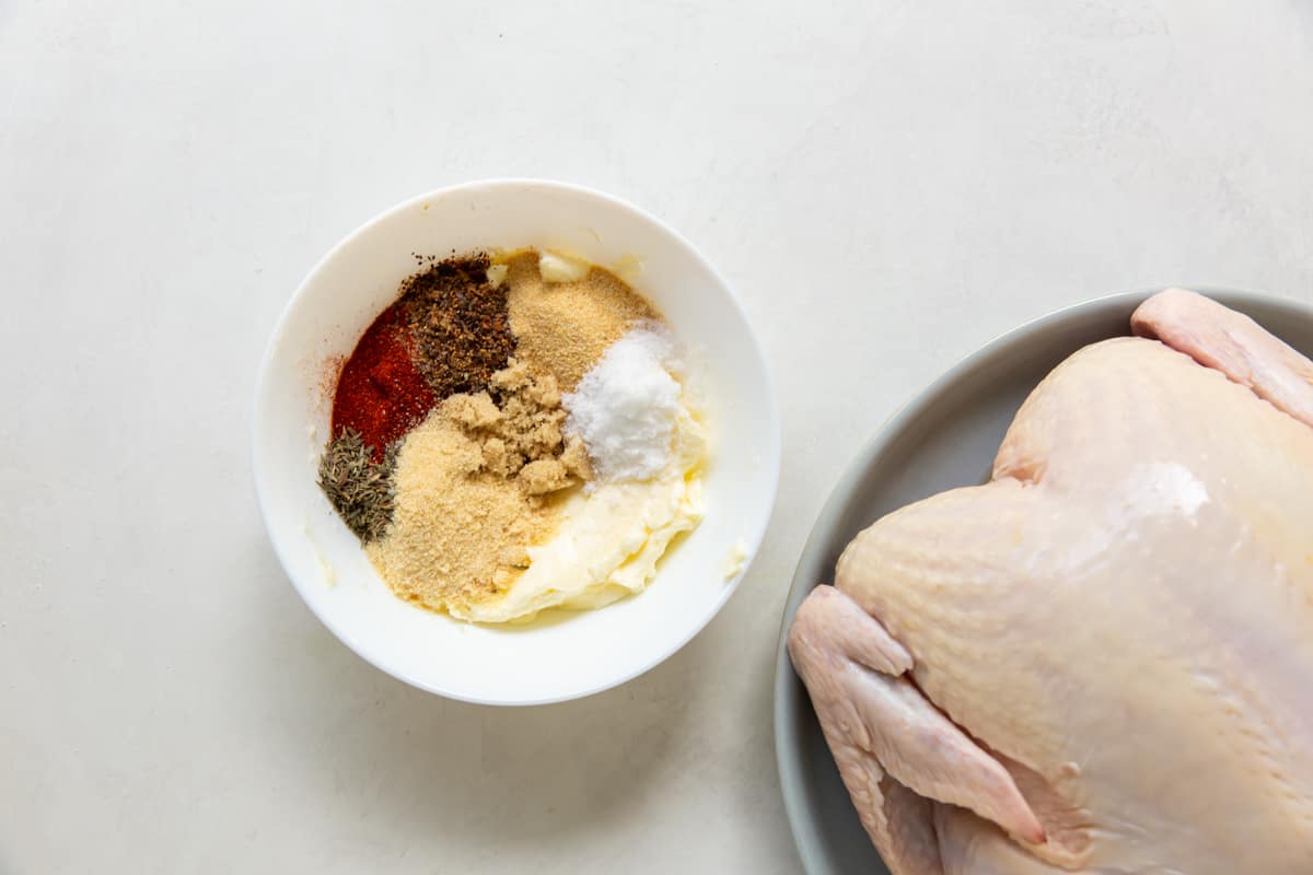 Butter and spices combined in a small bowl.