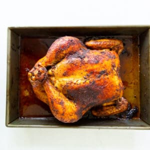 rotisserie chicken in a roasting pan