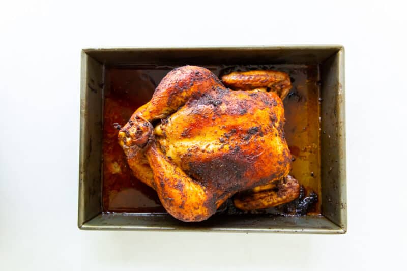 rotisserie chicken in a roasting pan