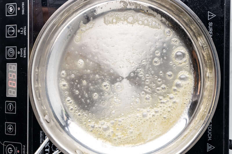melted butter in a frying pan.